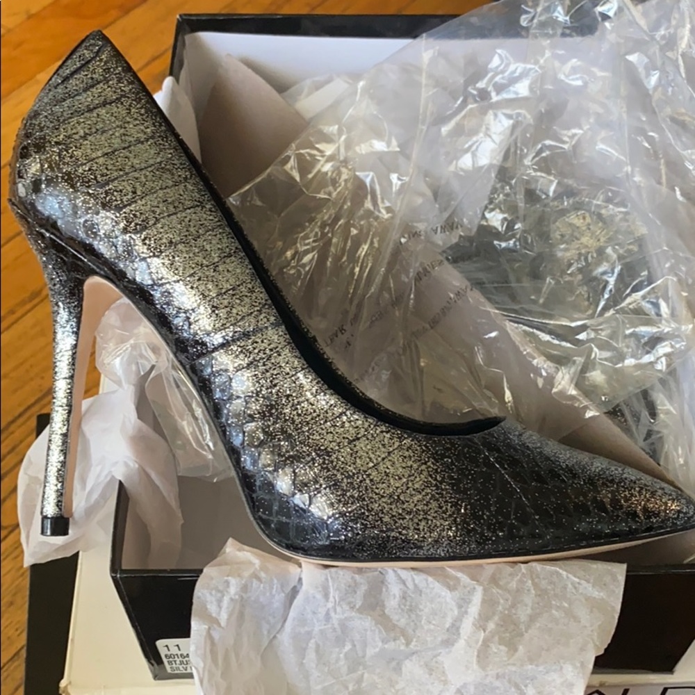 Never worn Silver Heels